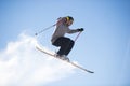 Freestyle ski jumper with crossed skis Royalty Free Stock Photo