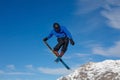 Freestyle ski jumper with crossed skis Royalty Free Stock Photo