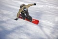 Freestyle snowboarder jump and ride Royalty Free Stock Photo