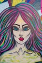 Portrait street art of girl with colorful hair