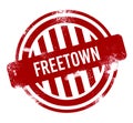 Freetown - Red grunge button, stamp