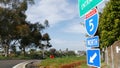 Freeway entrance, information sign on crossraod in USA. Route to Los Angeles, California. Interstate highway 5 signpost as symbol Royalty Free Stock Photo