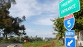 Freeway entrance, information sign on crossraod in USA. Route to Los Angeles, California. Interstate highway 5 signpost as symbol Royalty Free Stock Photo