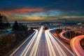 Freeway long exposure Light Trails in Seattle WA at Sunset Royalty Free Stock Photo