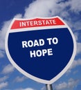 Freeway sign gives direction to a way to experience and have hope