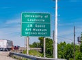 Freeway sign University of Louisville - LOUISVILLE. USA - JUNE 14, 2019