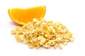 Freeze dried and fresh orange on a white background.