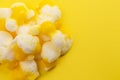 Freeze Dried Lemon Flavored Candy on a Bright Yellow Background Royalty Free Stock Photo