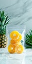 Freeze dried pineapple, dried pineapple in transparent bag on white marble background. Freeze-dried fruit concept. Royalty Free Stock Photo