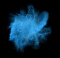 Freeze motion of blue powder exploding, isolated