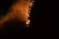 Freeze motion of color powder exploding on black background. Col Royalty Free Stock Photo