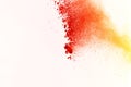 Freeze motion of color powder exploding on white background. Col Royalty Free Stock Photo