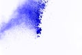 Freeze motion of color powder exploding on white background. Col Royalty Free Stock Photo