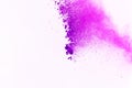 Freeze motion of color powder exploding on white background. Col Royalty Free Stock Photo