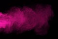 Freeze motion of colored dust explosion isolated. Purple powder Royalty Free Stock Photo