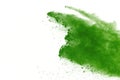 Freeze motion of Green powder exploding on white background. Royalty Free Stock Photo