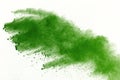 Freeze motion of Green powder exploding on white background. Royalty Free Stock Photo