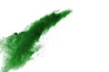 Freeze motion of green powder exploding on white background Royalty Free Stock Photo