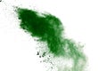 Freeze motion of green powder exploding on white background Royalty Free Stock Photo
