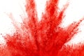 Freeze motion of red powder exploding, isolated on white background. Abstract design of red dust cloud. Particles explosion screen Royalty Free Stock Photo