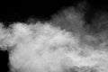 Freeze motion of white dust particles splash on black background.White powder explosion clouds Royalty Free Stock Photo