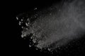 Freeze motion of white powder explosions on black backg Royalty Free Stock Photo
