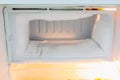 Freezer compartment of the refrigerator is very thick with ice Royalty Free Stock Photo