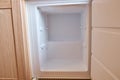 Freezer with ice on the walls in the built-in refrigerator. Close-up Royalty Free Stock Photo