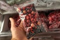 Freezing berries for the winter. Packaged frozen berries in plastic bags. In the freezer