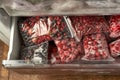 Freezing berries for the winter. Packaged frozen berries in plastic bags. In the freezer