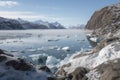 freezing fiord, with view of massive glacier in the distance