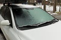 Freezing Rain Creates a Layer of Ice and Coats a Passenger Vehicle. Close up of Windshield Royalty Free Stock Photo