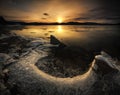 Freezing shores of Jonsvatnet lake near Trondheim, first snow, winter time, Norway Royalty Free Stock Photo