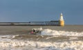 A Freezing, Snowy Morning At Blyth Beach, With A Lone Surfer In The North Sea