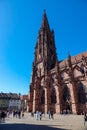 Freiburg Minster photographed from the side on a cloudless spring day Royalty Free Stock Photo