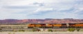 Freight  BNSF train, canyon de Chelly area, banner, sunny spring day in Chinle, Arizona, USA Royalty Free Stock Photo