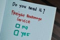 Freight Brokerage Service write on a book and supported by additional services write on a sticky notes isolated on Wooden Table