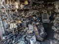 freight container filled with used car parts on junkyard shop