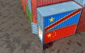 Freight containers with China and Democratic Republic of the Congo flags.