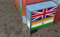 Freight containers with India and United Kingdom national flags.