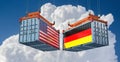 Freight containers with USA and German national flags. Royalty Free Stock Photo