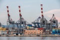 Freight Cranes in La Spezia. Mediterranean Shipping Harbor in evening