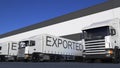Freight semi truck with EXPORTED caption on the trailer loading or unloading
