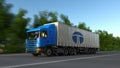 Freight semi truck with Tata Group logo driving along forest road. Editorial 3D rendering