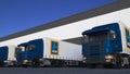 Freight semi trucks with Aldi logo loading or unloading at warehouse dock. Editorial 3D rendering Royalty Free Stock Photo