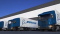 Freight semi trucks with Boeing Company logo loading or unloading at warehouse dock. Editorial 3D rendering