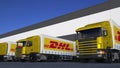 Freight semi trucks with DHL Express logo loading or unloading at warehouse dock. Editorial 3D rendering