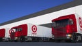 Freight semi trucks with Target Corporation logo loading or unloading at warehouse dock. Editorial 3D rendering