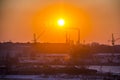 Freight shipping containers and gas tanks at the docks. in import export and business logistic. Trade Port, Ship cargo to harbor. Royalty Free Stock Photo