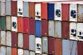 Freight shipping. Dozens of cargo containers stacked in a shipping yard